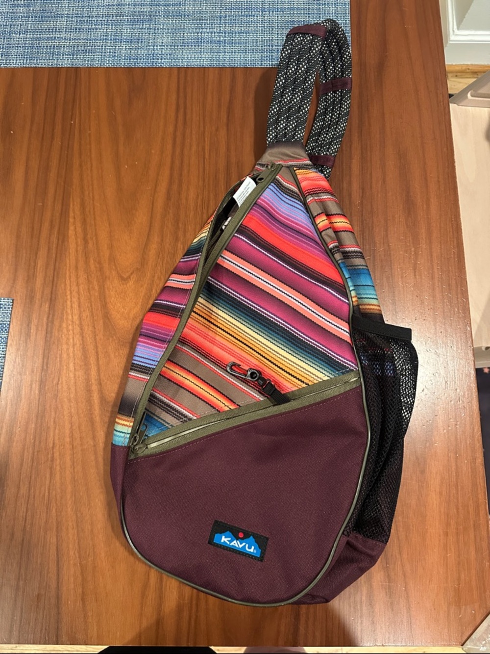 Kavu Paxton Burgundy Sling Bag with Multicolor Stripes